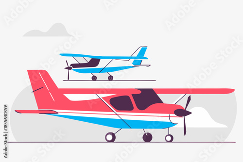 Two small planes flying in cloudy sky