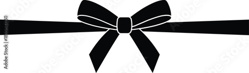 A black ribbon tied in a bow on white background