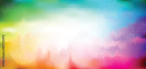 An abstract colorful background featuring soft bokeh and a bright rainbow pattern creates a blurred summer nature design with pastel light and motion for a vibrant wallpaper backdrop