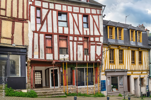 Street with historical half-timbered house in Vannes, France