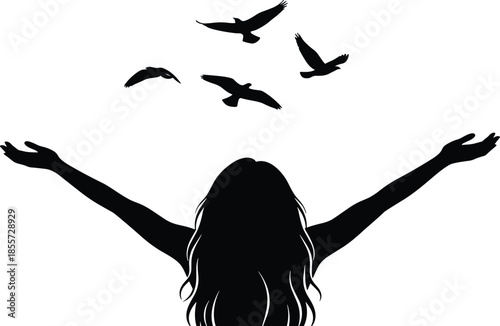 Black silhouette of woman with raised arms and flying birds, freedom inspiration concept, hope peace release, female back view, spiritual