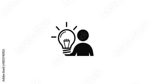 A silhouette of a person holding a glowing light bulb, symbolizing a bright idea or innovation.