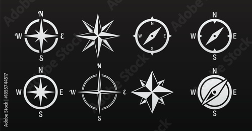 set of isolated white icons on a theme compass