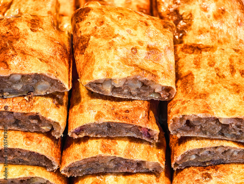 Apple Strudel Pastry Rolls with Fruit Filling Fresh Baked Bakery Display Modern Lifestyle Sweets Background