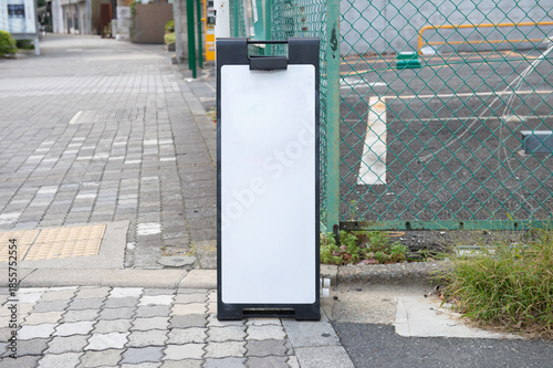 Large blank billboard on a street wall, banners with room to add your own text