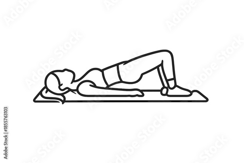 Woman performing a glute bridge exercise on a yoga mat