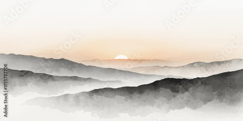 A misty sunrise glows over a snowy mountain landscape as morning light pierces through thick fog and clouds to reveal a serene valley forest at dawn