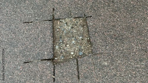 Place of selection of the kernel in the form of a rectangular from asphalt concrete pavement. Kern. Close-up
