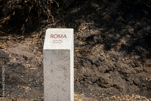 Via Francigena (pilgrim's route to Rome) way marker showing the direction to Rome