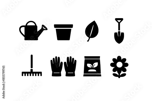 Essential gardening tools and supplies set including watering can, shovel, rake, and gloves