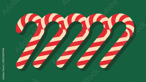Vibrant candy canes on green background for Christmas decoration
