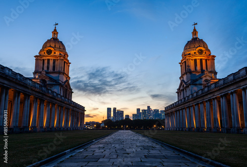 Obraz na płótnie Old Royal Naval College in Greenwich, London at sunset with city skyline in the background