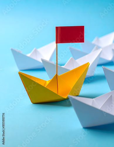 Yellow Paper Boat with Red Flag Leading White Boats on Blue Background
