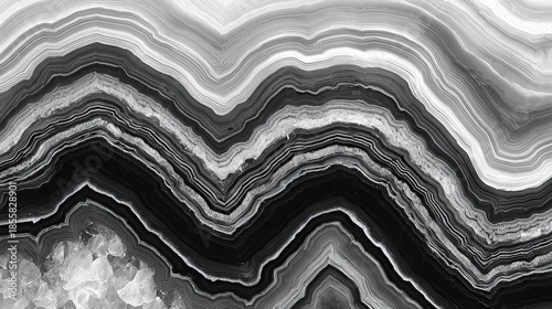 Abstract grayscale rock strata display with undulating layers and crystal formations