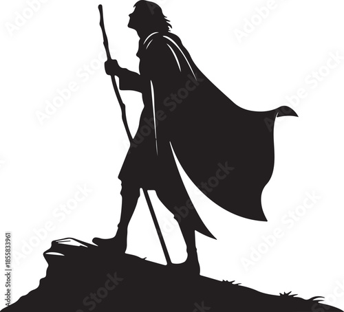 Black silhouette of a pilgrim or fantasy hero with staff and flowing cape