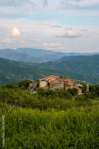 Wallpaper Mural Small village Antist in the Vall Fosca, Catalonia, Pyrenees. Unknown tourism. Silent travel, and supporting local, sustainable experiences. Golden evening hour. Torontodigital.ca