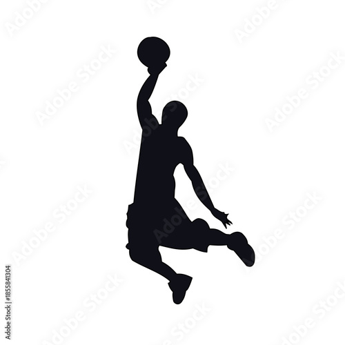 silhouette of a man jumping with ball