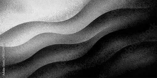 Luxury black and white fabric texture featuring smooth silk and satin waves with a soft crumpled linen pattern for a shiny fashion textile backdrop