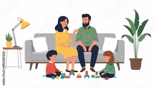 Family Sitting Together On Sofa With Children Playing On Floor.