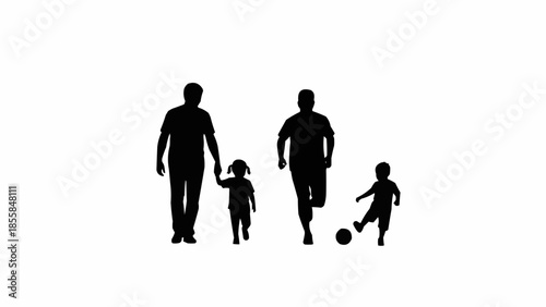Family Silhouette Playing Soccer Together Outdoors.