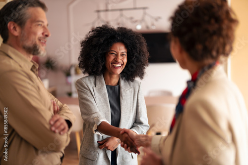 Friendly Handshake Between Colleagues In A Bright Office During A Professional Meeting