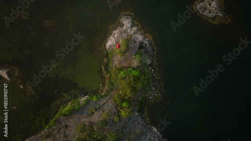 Wallpaper Mural Top-Down Drone View of Red Tent on Rocky Island in Nordic Lake at Sunset Torontodigital.ca