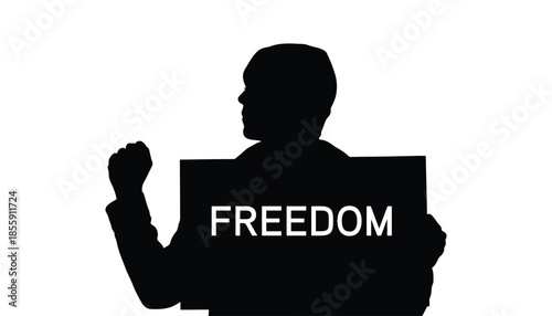 A silhouette of a man holding a sign that reads 'freedom' in bold white letters conveying a powerful message of liberty and human rights