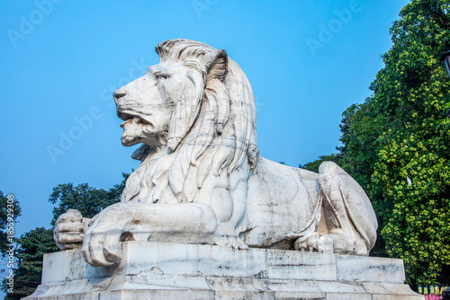 kolkata India 12th Dec 2025: Marble lion statues in the gardens of Victoria Memorial stand as powerful guardians, symbolizing authority, dignity, and the imperial grandeur of the memorial’s landscape 