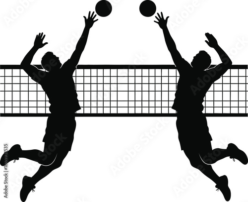 Volleyball players jumping to hit the ball
