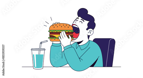 Hungry man in a turquoise shirt taking an enormous bite out of a large delicious hamburger with a drink on the table nearby.