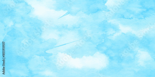 A white jet flys high through the clear blue summer sky leaving a trail among soft white clouds and bright sunlight for a beautiful nature cloudscape