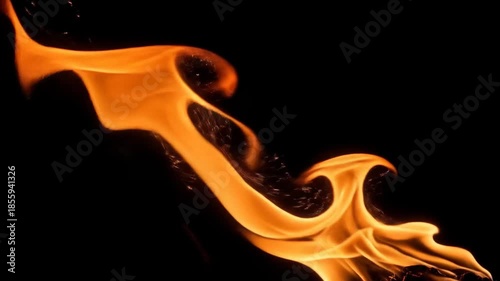 Abstract orange flame swirls gracefully against a dark background with textured details.