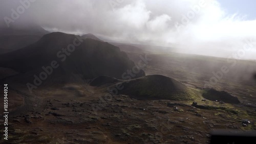 Foggy Volcanic Hills with Dark Slopes Aerial View