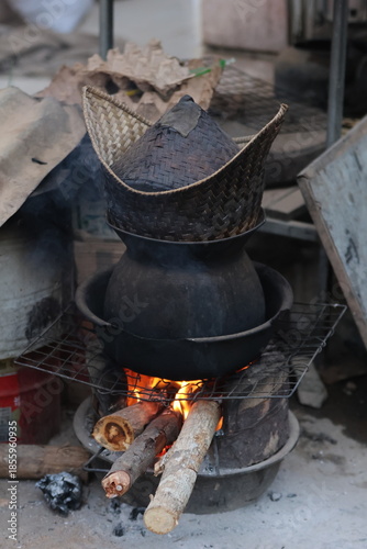 lao sticky rice steaming in the early morning