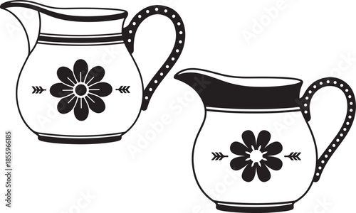 Two vintage pitchers with floral designs a black and white illustration