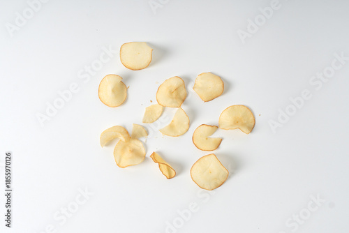 cassava chips or keripik singkong on white background, fried cassava snack.