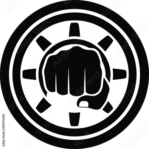 Fist in the center of a circular emblem with radial elements