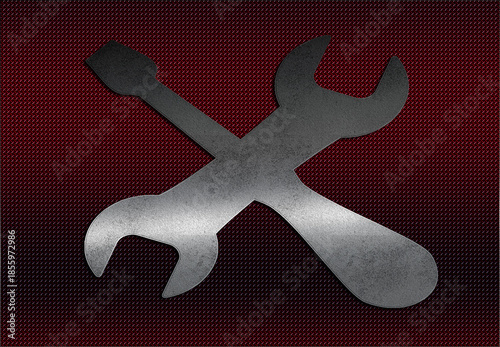 wrench and screwdriver on red background