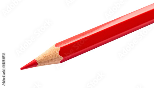 A close-up of a sharpened red pencil tip against a stark black background