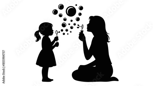 A mother and daughter share a moment of joy blowing bubbles silhouette