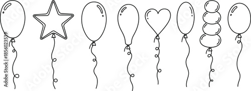 A collection of seven decorative spoons with various shapes