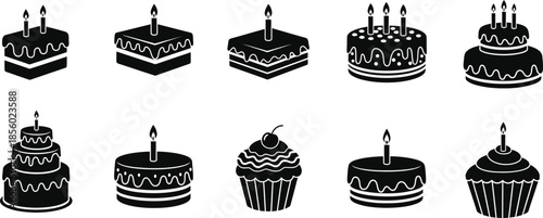 Collection of intricately designed black candles with white details