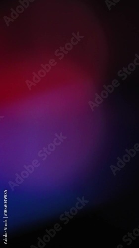 Abstract dark video with gradual light leaks and subtle color shifts for background or visual effect enhancement projects.