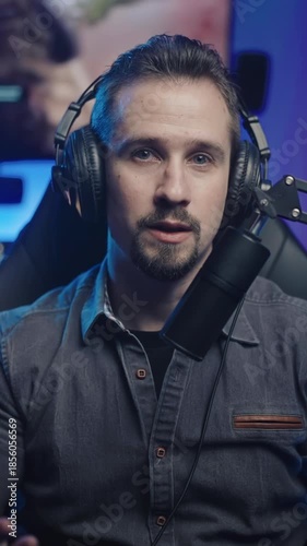 Gamer influencer streaming live talking to fans with game playing in background