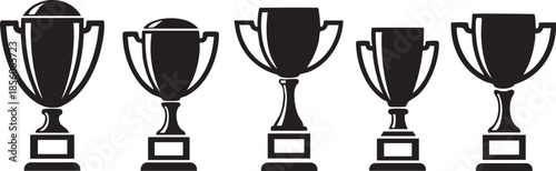 Five black and white trophy cups lined up in a row on a plain background