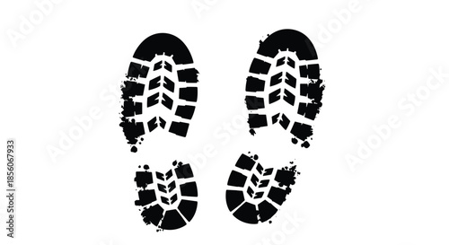 Black silhouette of two boot or shoe footprints with textured tread patterns showing mud or dirt splatters on a white background.