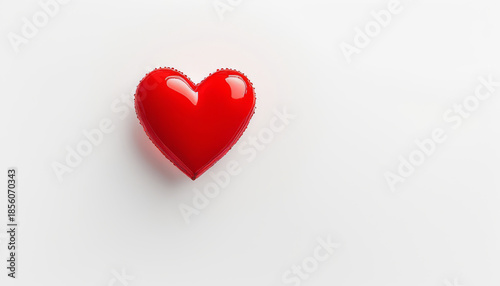 Minimalist Valentine’s Day scene with red heart shape on a clean white background, strong copy space, commercial design
