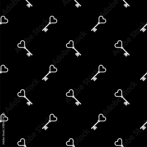 Heart old house key seamless pattern isolated on black background