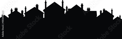 Black silhouette of a city skyline at dusk or dawn