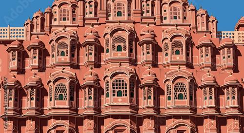 The intricate pink sandstone facade of the Hawa Mahal, the Palace of Winds, in Jaipur, India.